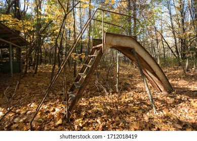 Abandoned Playground In Ghost Town Pripyat, Post Apocalyptic City, Autumn Season In Chernobyl Exclusion Zone, Ukraine