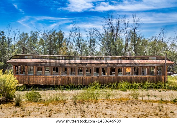 Abandoned rail car on\
tracks
