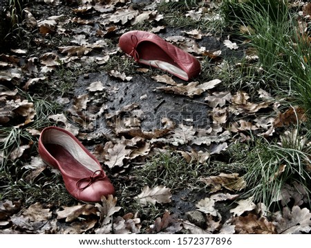 abandoned red shoes symbol of violence against women
