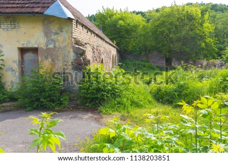 Abandoned ruined building in rural Lithuania