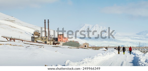 Abandoned Russian mining village of pyramiden\
svalbard norway with last coal\
car