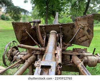 An Abandoned, Rusted Artillery Gun