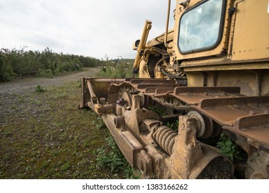 Abandoned rusty bulldozer isolated example