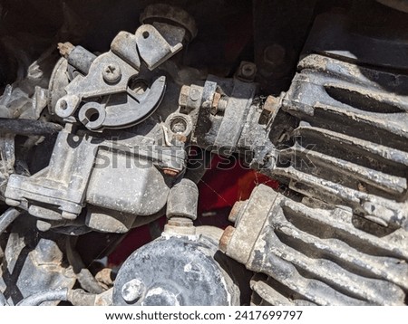 an abandoned and rusty motorbike engine
