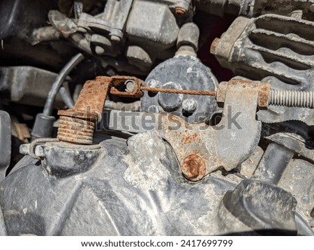 an abandoned and rusty motorbike engine