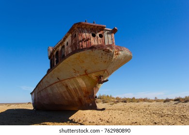 The Abandoned Rusty Ship In The Desert. Aral Sea, Uzbekistan. 