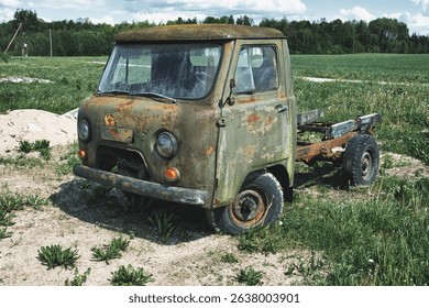 Abandoned Rusty Soviet-Era Truck UAZ in Rural Field
