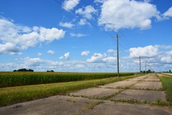 An Abandoned Section Of The Old Route 66 Remains Feet From The New Road In Central Illinois Outside Of The Town Of Pontiac.