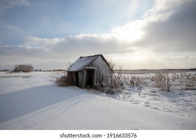 Abandoned shack in the countryside on a cold winter day, Ontario, Canada - Powered by Shutterstock