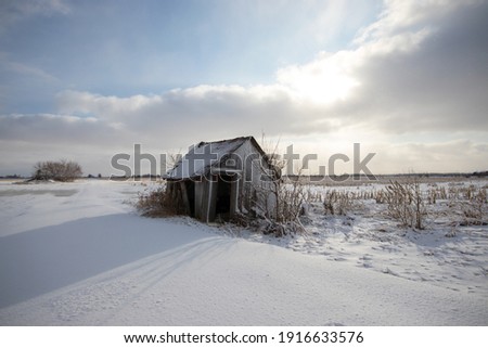 Abandoned shack in the countryside on a cold winter day, Ontario, Canada