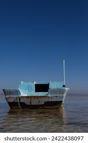 Abandoned ship after a wreck. Fishing boat is aground in the red sea