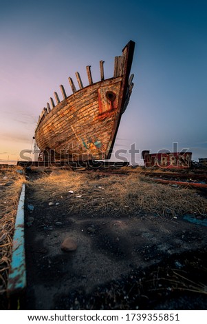 Abandoned shipwreck during sunset in Akranes - Iceland