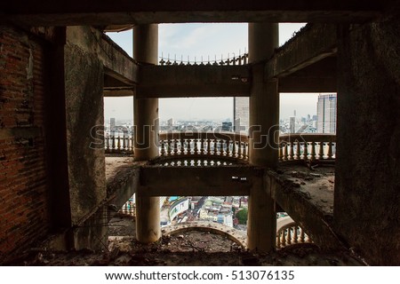 Abandoned skyscraper view, architecture skyline through abandoned balcony