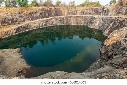 An Abandoned Stone Quarry Filled With Rain Water In Kerala, India