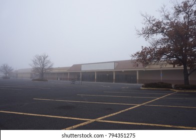 Abandoned Strip Mall In Fog