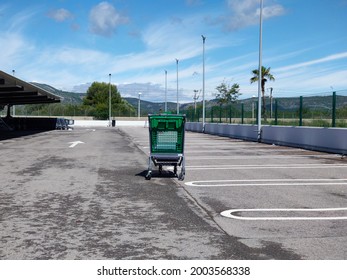 Abandoned Supermarket Car Park With Shopping Trolley