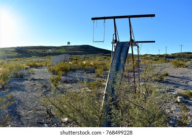 Abandoned Swingset In The Desert