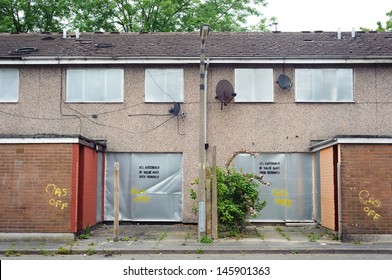 Abandoned Terraced Housing With Metal Shutters, Salford, UK