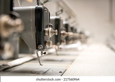 Abandoned textile factory - sewing machines - Shutterstock ID 217560964