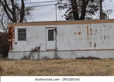 Abandoned Trailer House With A Yard