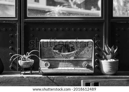 A abandoned transistor radio out of order can't play Oldies Hit songs  anymore
