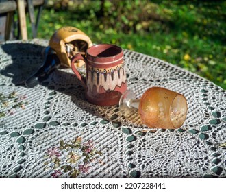 Abandoned Turned Over Wineglass On A Messy Table, Outdoor Shot