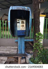 Abandoned Vintage Blue Phone Booth