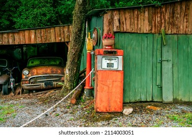 Abandoned Vintage Car Covered With Layer Of Dust In The Shed