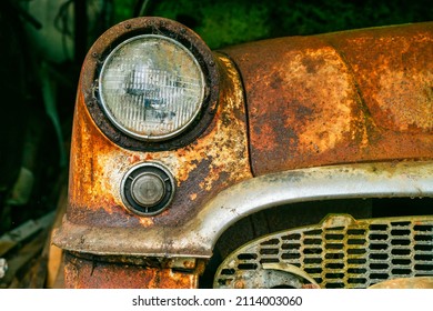 Abandoned Vintage Car Covered With Layer Of Dust In The Shed