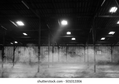 Abandoned Warehouse. Black And White Image. Noise Scene.