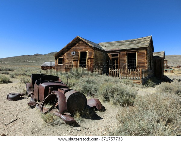 Abandoned wooden farmhouse in ghost town Bodie,\
California - landscape\
photo