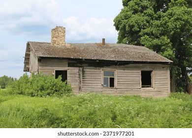 Abandoned wooden farmhouse in Sece, Latvia