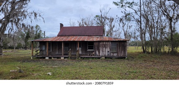 Abandoned Wooden Home With Rusted Metal Roof In North Florida 