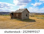 Abandoned wooden house in the badlands near the Dorothy hamlet in Alberta, Canada