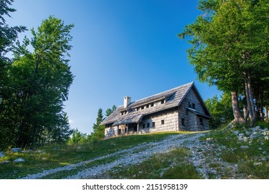 Abandoned wooden house in Julian Alps. Vogel mountain near famous Bohinj lake, Slovenia.