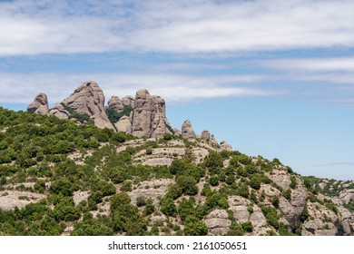 Abbey of Santa Maria de Montserrat in Monistrol, on a beautiful spring day, Catalonia, Spain. Very close to Barcelona is one of the most magical places in Catalonia.
