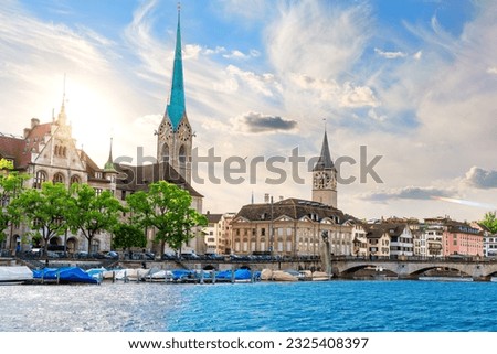 Fraumünster abbey and St. Peter's church, the two most popular places of visit in Zurich, Switzerland [[stock_photo]] © 