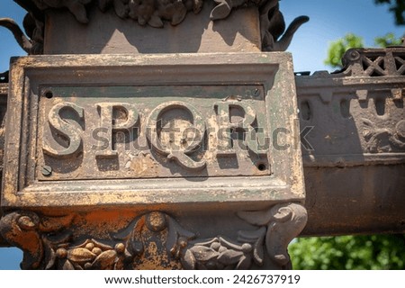 Abbreviation close-up letters SPQR in Rome.