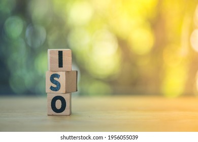 The Abbreviation ISO On Wooden Cubes. ISO Quality Control Certification Concept.