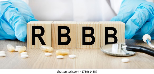 Abbreviation RBBB Right Bundle Branch Block Text Acronym On Wooden Cubes On Wooden Table. Medicine Concept.