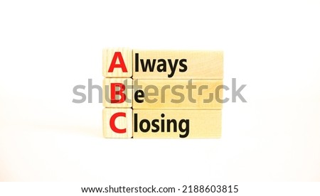 ABC always be closing symbol. Concept words ABC always be closing on wooden blocks on a beautiful white table white background. Business and ABC always be closing concept. Copy space.