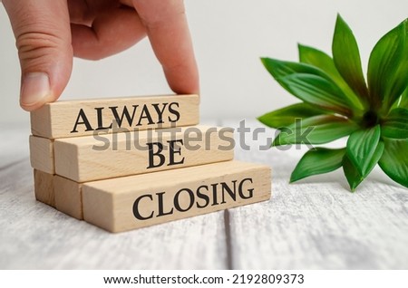 ABC always be closing symbol. Concept words ABC always be closing on wooden blocks on a beautiful wooden background