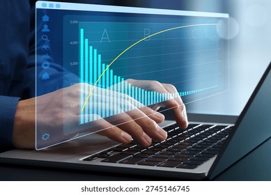 ABC analysis chart for inventory management. Demand classification and item prioritization using Pareto principle. Businessman using laptop computer to develop data-driven replenishment plan.
