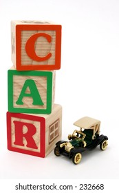 ABC Blocks Spelling Car And Black Antique Car.