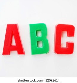 ABC Written On Fridge Door With Fridge Magnet Alphabet Letters.