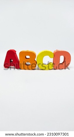 ABCD alphabet wooden toys isolated on white background