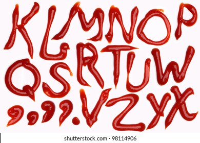 A-B-C-D-E-F-G-H-I-J Alphabet Letters Made With Tomato Ketchup Sauce On White Background (isolated On White).  Make Your Own Words In Ketchup.