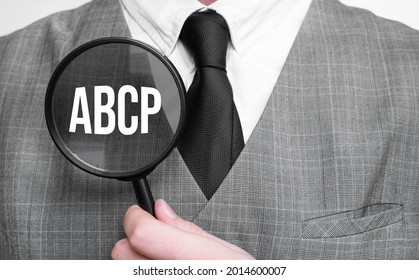Abcp Acronym Of Master Of Business Administration Degree. Education Concept. Businessman Hands With Magnifier.