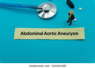 Abdominal Aortic Aneurysm.The word is written on a slip of colored paper. health terms, health care words, medical terminology. wellness Buzzwords. disease acronyms.