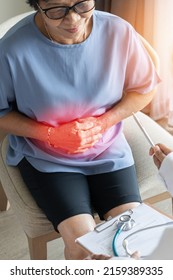 Abdominal Pain In Elder Senior Mature Aging Woman With Stomachache Illness From Stomach Cancer, Irritable Bowel Syndrome, Indigestion, Diarrhea Or GERD (gastro-esophageal Reflux Disease)